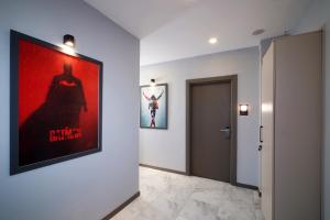 a hallway with a movie poster on the wall at Meet İstanbul Hotel Kadikoy in Istanbul +22 photos