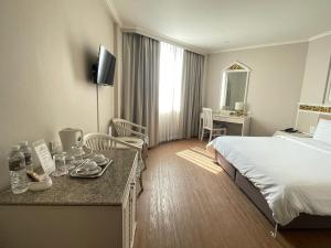 Sjónvarps- og/eða afþreyingartæki á Wangcome Hotel