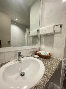 Baðherbergi á Wangcome Hotel