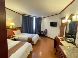 Sjónvarps- og/eða afþreyingartæki á Wangcome Hotel