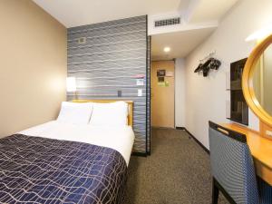 Postel nebo postele na pokoji v ubytování APA Hotel Kanku-Kishiwada + 37 fotografií