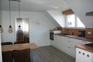 Kuchyň nebo kuchyňský kout v ubytování Ferienwohnung Löwenburg