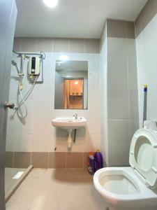 a bathroom with a toilet and a sink at 5mins to Sunway #Subang SS15 Stylish Studio #3pax in Subang Jaya
