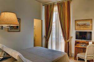 Een bed of bedden in een kamer bij Casa Sotgiu Guest House