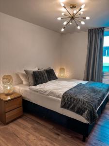 سرير أو أسرّة في غرفة في Ferienwohnung Sonnenhof