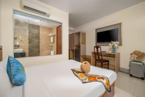TV in/ali zabaviščno središče v nastanitvi SeaFront Hotel DaNang