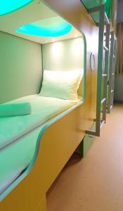 a bunk bed in a room with a bunk bed at Green Cube Capsule Hostel in Sofia
