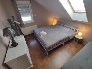 מיטה או מיטות בחדר ב-Holiday home in Kereki - Balaton 48109