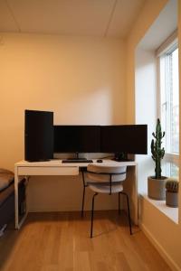 TV/trung tâm giải trí tại Modern apartment in Aarhus with free parking