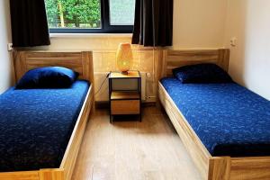 Postel nebo postele na pokoji v ubytování Aurora, Wijk de Brabander 74