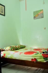 Tempat tidur dalam kamar di Serene Home