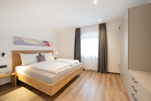 Ένα ή περισσότερα κρεβάτια σε δωμάτιο στο Moerlhof