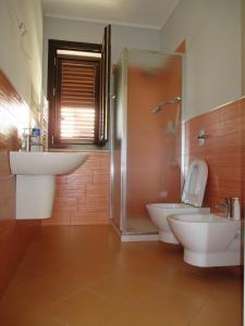Et badeværelse på Villetta Airone