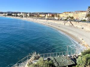 a view of a beach and the ocean at John Homestay Room in Nice in Nice