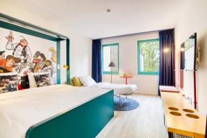 Postel nebo postele na pokoji v ubytování B&B HOTEL Brussels Centre Louise