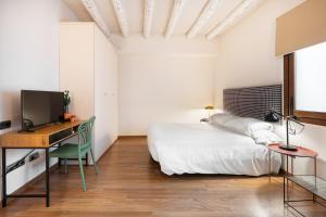 Postel nebo postele na pokoji v ubytování Hostal Pichorradicas
