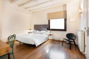 Postel nebo postele na pokoji v ubytování Hostal Pichorradicas