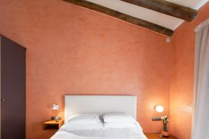 Postel nebo postele na pokoji v ubytování Hostal Pichorradicas
