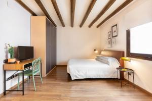 Postel nebo postele na pokoji v ubytování Hostal Pichorradicas