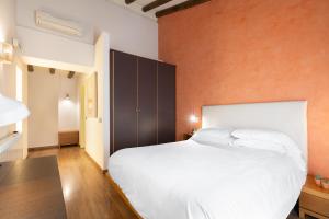 Postel nebo postele na pokoji v ubytování Hostal Pichorradicas