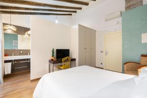 Postel nebo postele na pokoji v ubytování Hostal Pichorradicas