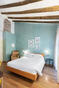Postel nebo postele na pokoji v ubytování Hostal Pichorradicas