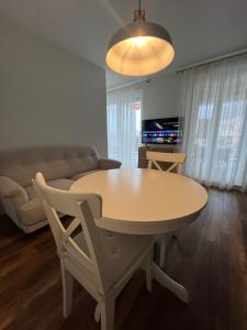 TV a/nebo společenská místnost v ubytování RINO