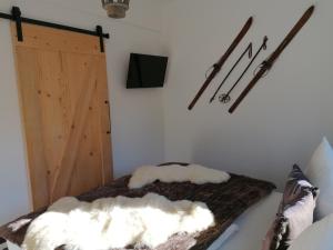 Postel nebo postele na pokoji v ubytování Appartements Bergliebe