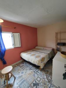 Voodi või voodid majutusasutuse Casa Mamre toas