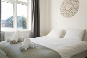 Postel nebo postele na pokoji v ubytování Boho Nest