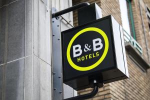 Ett certifikat, pris eller annat dokument som visas upp på B&B HOTEL Brussels Centre Louise