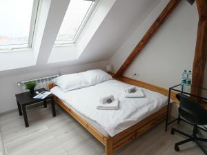 Posteľ alebo postele v izbe v ubytovaní Sleep In Center