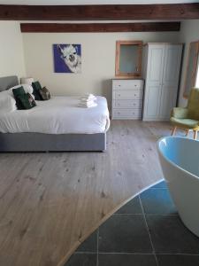 Voodi või voodid majutusasutuse K2Cottages toas