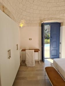 Postel nebo postele na pokoji v ubytování Borgofreddo Luxury Suite