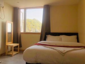 Letto o letti in una camera di Hotel Odaan