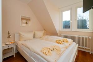Ein Bett oder Betten in einem Zimmer der Unterkunft Ferienhaus Sprotte