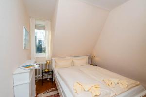 Ein Bett oder Betten in einem Zimmer der Unterkunft Ferienhaus Sprotte