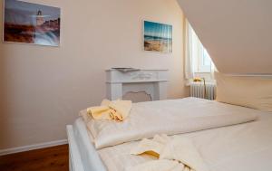 Ein Bett oder Betten in einem Zimmer der Unterkunft Ferienhaus Sprotte