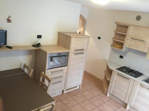 Kuchyň nebo kuchyňský kout v ubytování Residence Cima Tosa