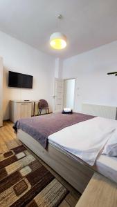 Voodi või voodid majutusasutuse Neva Apartments toas