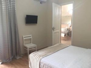Letto o letti in una camera di Hotel Martini Kvariati