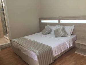 Letto o letti in una camera di Hotel Martini Kvariati