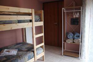 Palanda nebo palandy na pokoji v ubytování Casa Vacanze Sud e Magia