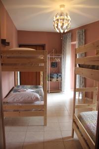 Postel nebo postele na pokoji v ubytování Casa Vacanze Sud e Magia
