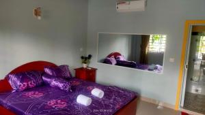 Voodi või voodid majutusasutuse Mabuhay Guesthouse Kampot toas