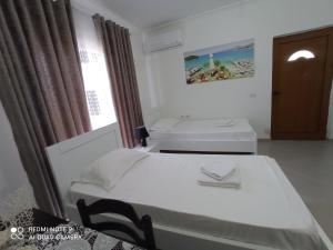 Postel nebo postele na pokoji v ubytování Amar Seaside