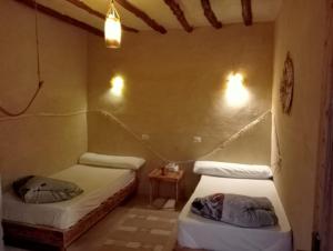 Postel nebo postele na pokoji v ubytování Siwa ajubar resort + 38 fotografií