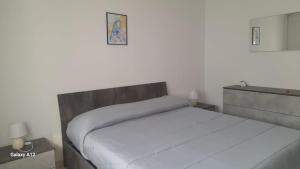 Ein Bett oder Betten in einem Zimmer der Unterkunft Villino Lufina
