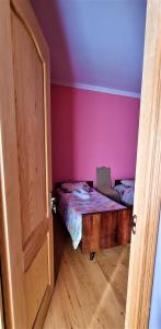 Postel nebo postele na pokoji v ubytování Rita Gujejiani Guest House