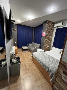 TV a/nebo společenská místnost v ubytování Hotel G&G